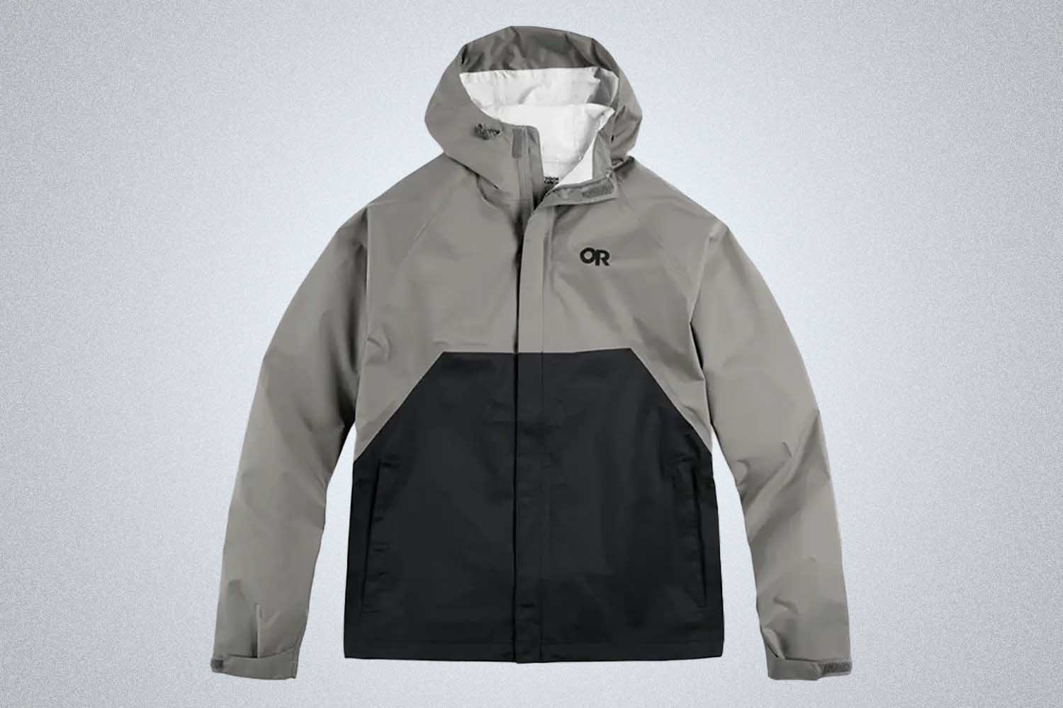 a grey and black lightweight jacket from Outdoor Research on a grey background