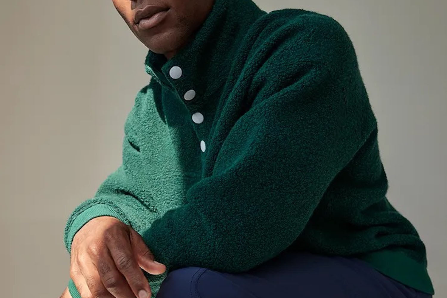 a model in a green outdoors voices fleece top