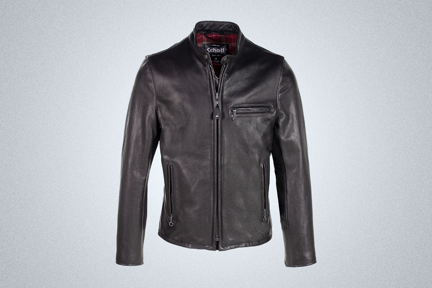 The Schott Waxed Natural Pebbled Cowhide Cafe Leather Jacket on gray background