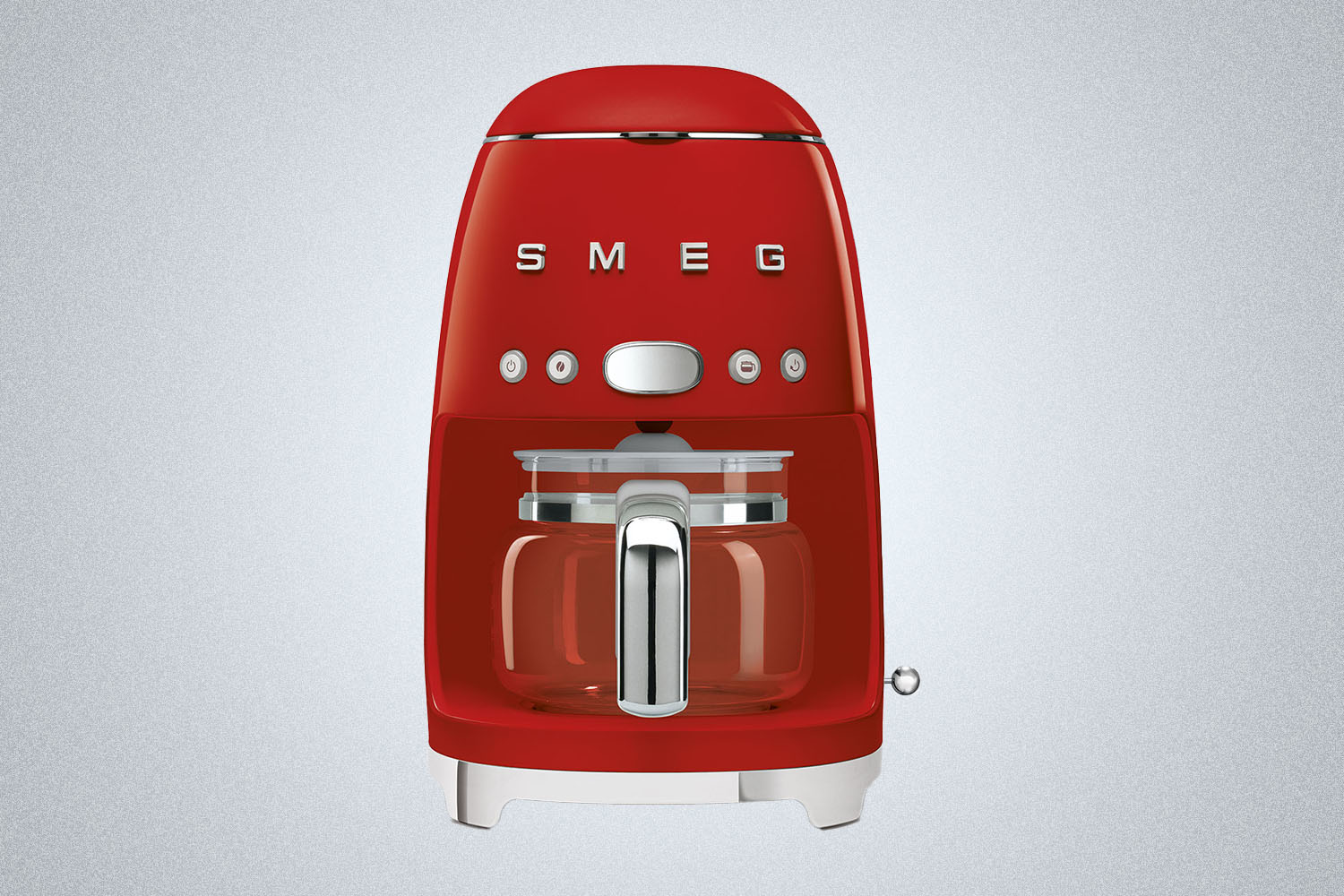 A red Smeg Drip Filter Coffee Machine on a gray background