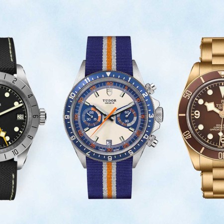 Tudor Black Bay Pro, Tudor Heritage Chrono Blue and Tudor Black Bay Fifty-Eight Bronze watches, on a light blue background