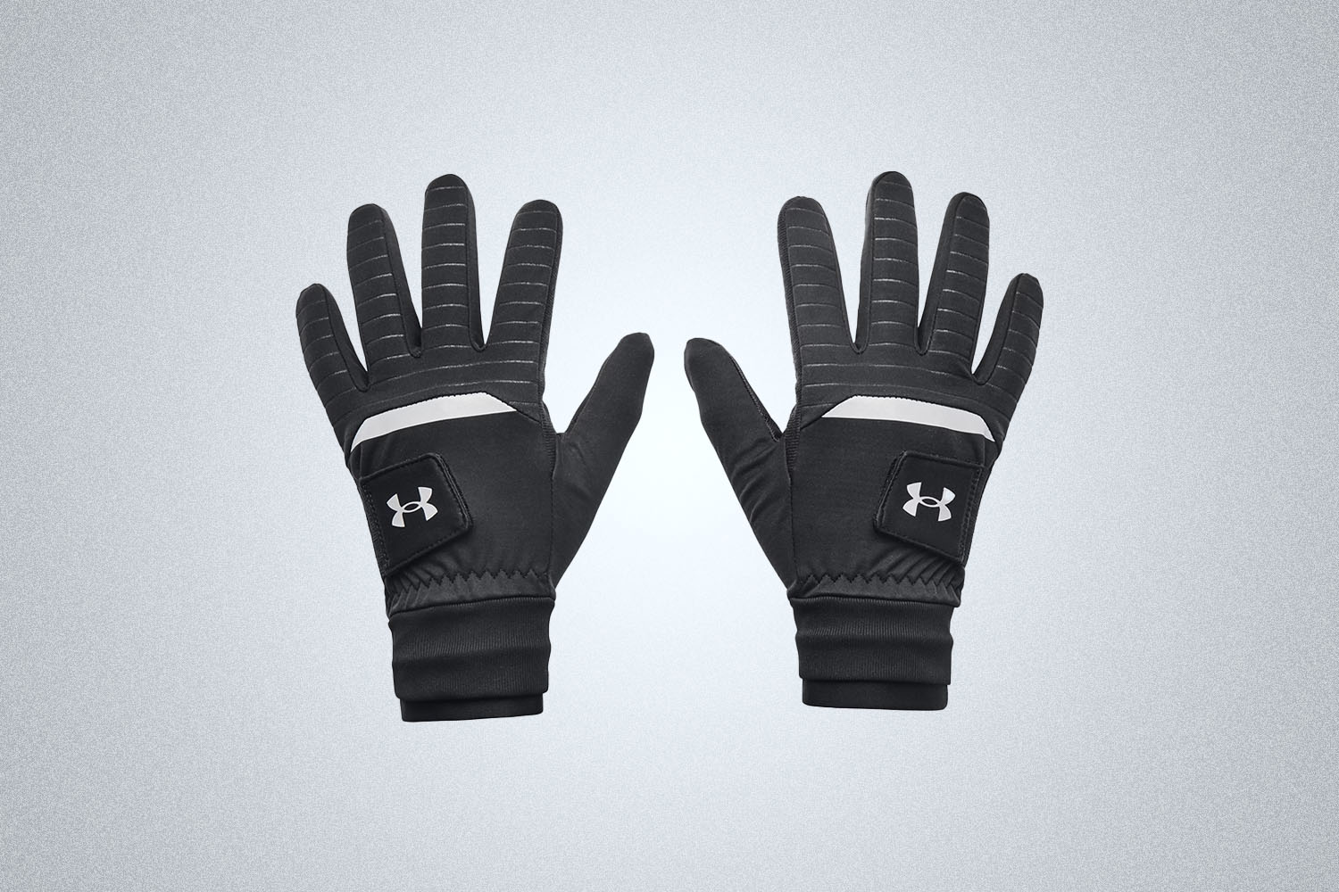 The Under Armour Men's ColdGear Infrared Golf Gloves on a gray background.
