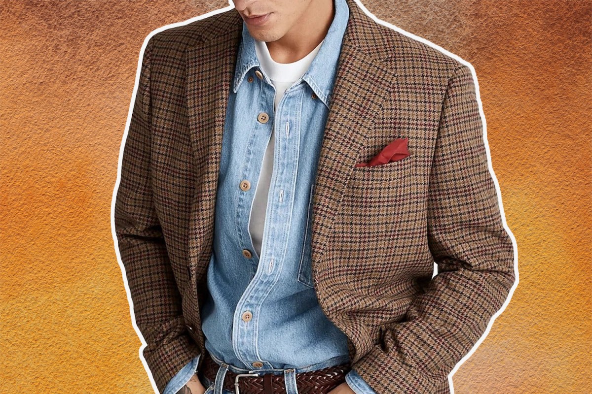 A photo of a model in a houndstooth jacket from Madewell on an orange background