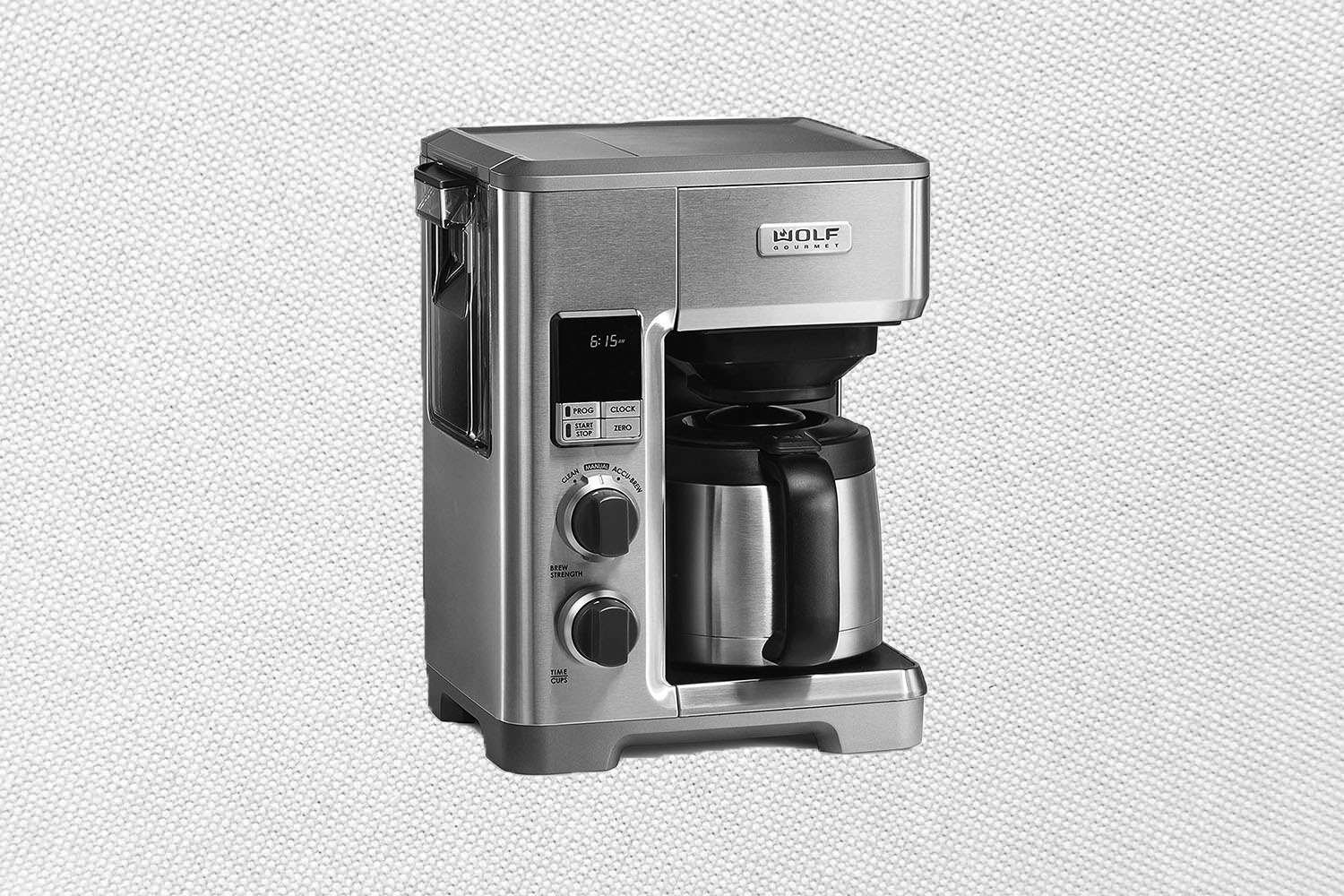 The Wolf Programmable Coffee System on a patterned white background