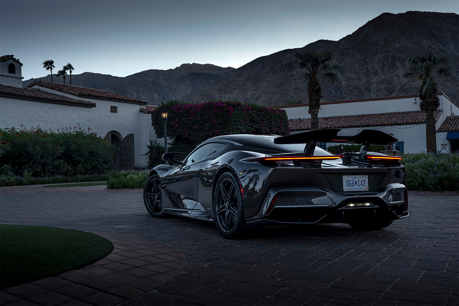 Automobili Pininfarina's new electric hypercar shown from the back in the US at dusk