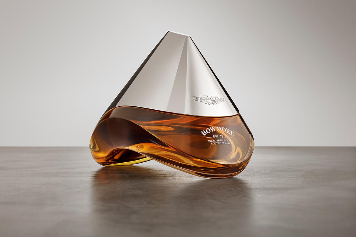 A bottle of Bowmore ARC-52, a collaboration with Aston Martin, on a table.