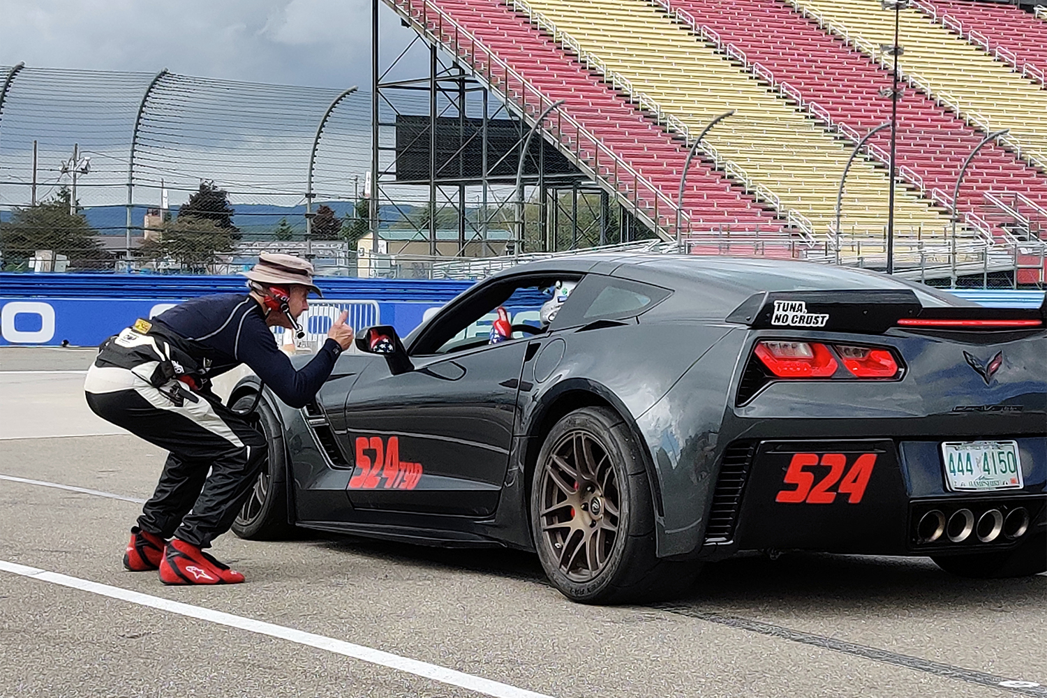 A Corvette hitting the track at Watkins Glen International racetrack with a "Tuna, No Crust" sticker alluding to the Fast and the Furious