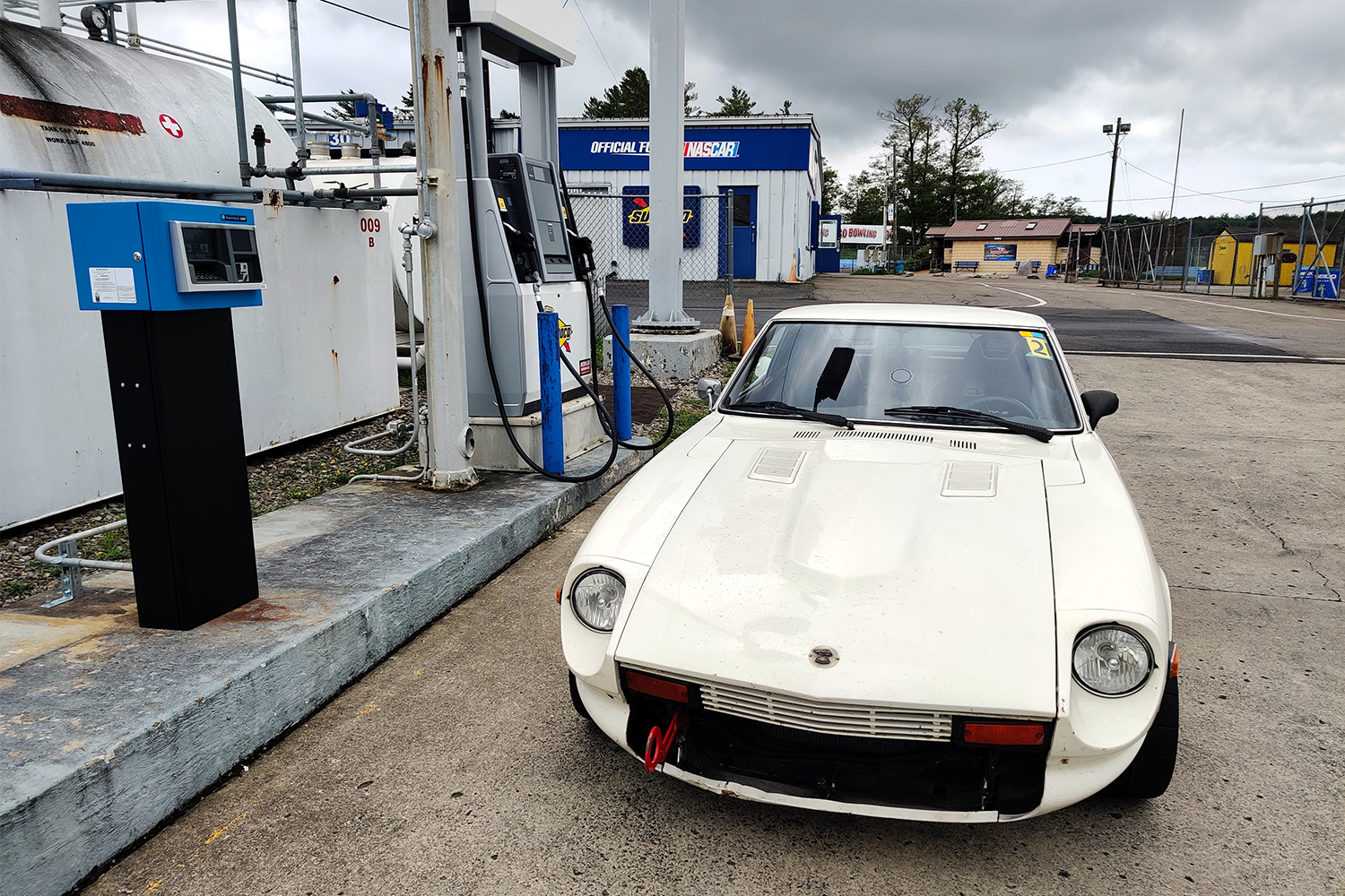 My white 1978 Datsun 280Z filling up with gas before hitting the track at Watkins Glen
