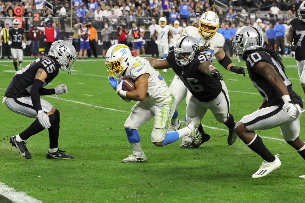 Austin Ekeler of the Chargers scores a touchdown against the Raiders