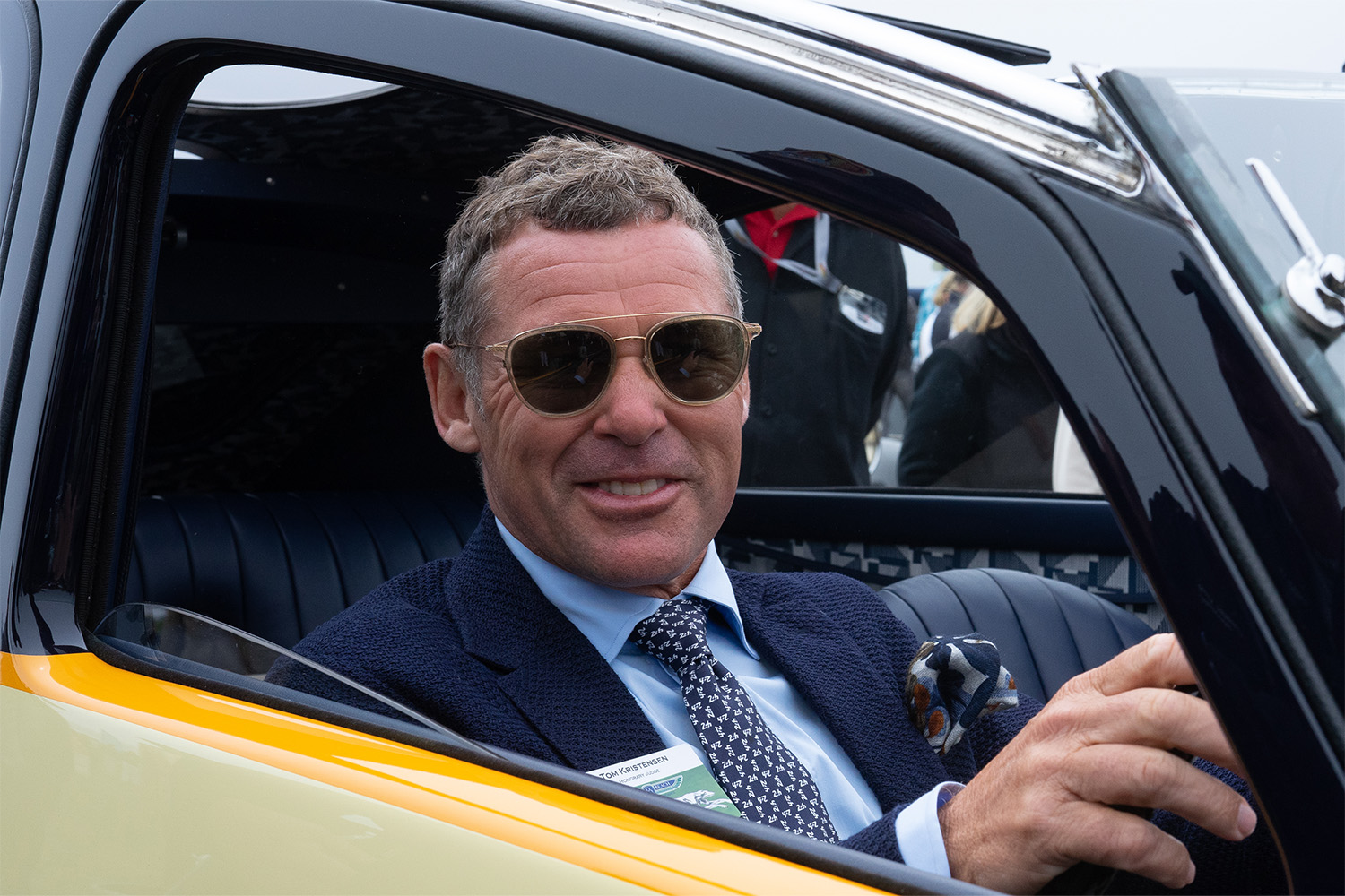 Grand Marshall Tom Kristensen judging rare cars at the Coucourse d'Elegance.