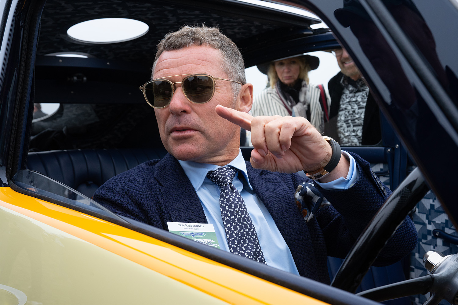 Grand Marshall Tom Kristensen judging rare cars at the Coucourse d'Elegance.