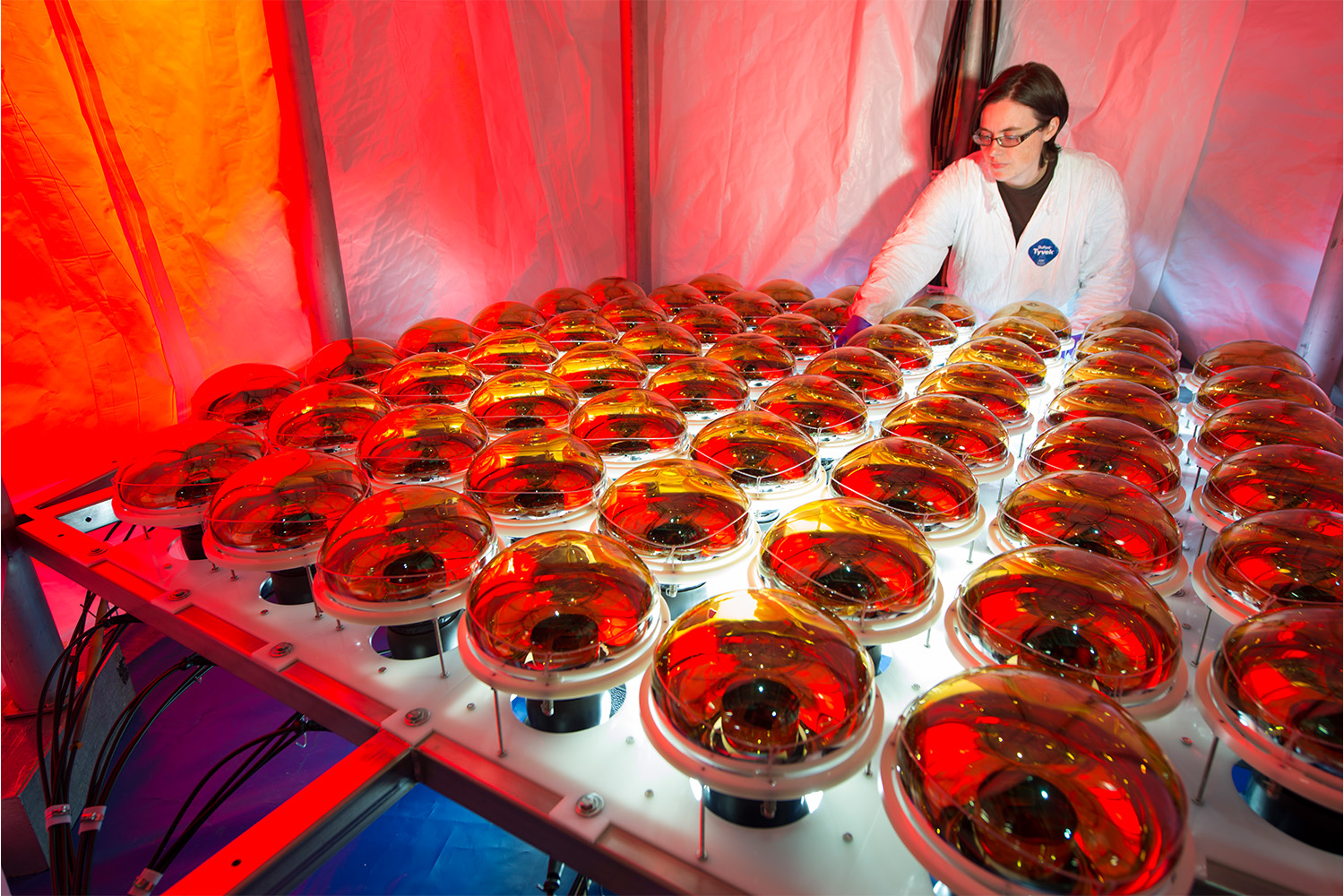 Carrie McGivern uses photomultipliers in the ANNIE neutrino detector at Fermilab.