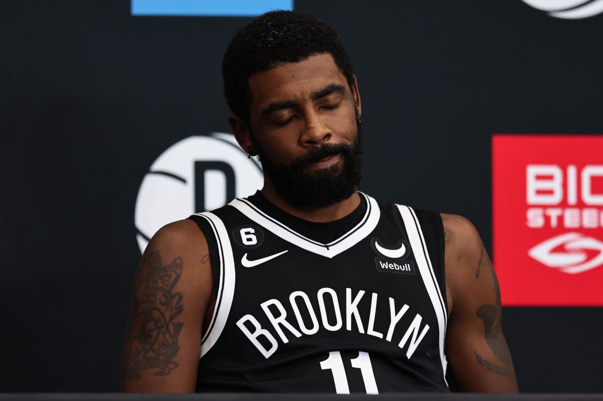 Kyrie Irving at a press conference at Brooklyn Nets media day. He said he gave up a $100 million contract to stay unvaccinated.