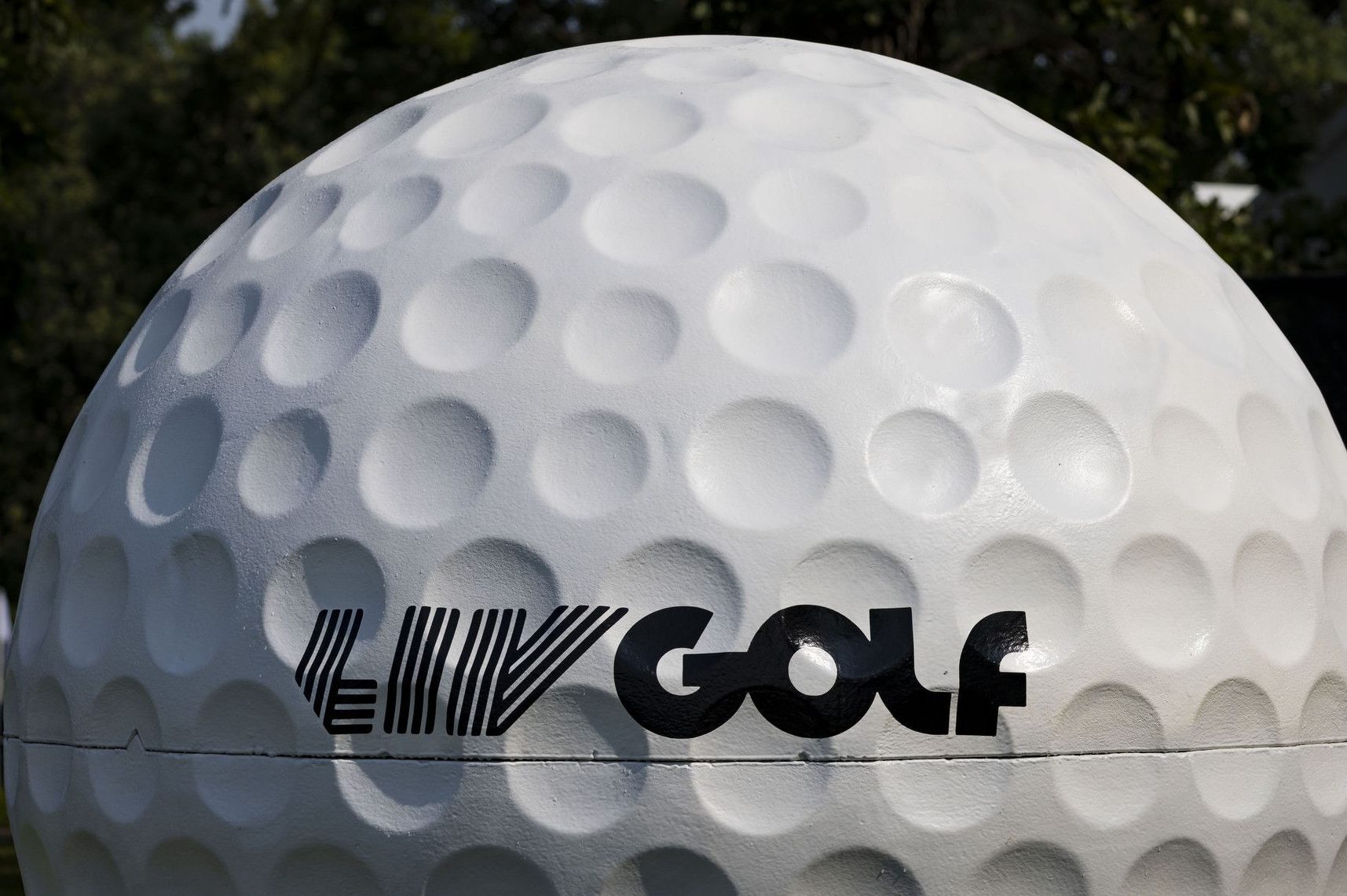 Signage on a golf ball at the LIV Golf tournament at Rich Harvest Farms in Sugar Grove, Illinois.