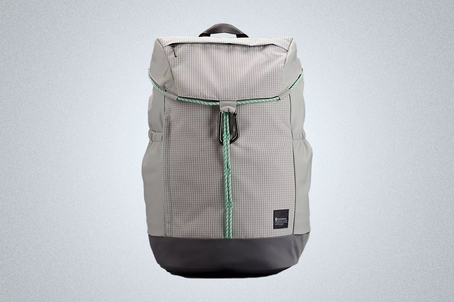 a grey backpack from the lululemon we've made too much sale on a model on a grey background
