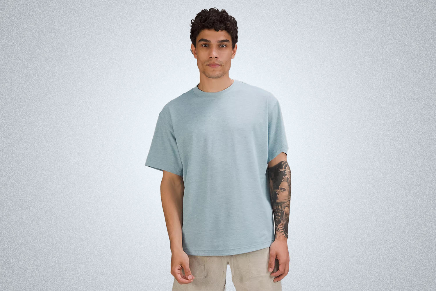 a relaxed blue tee from the lululemon we've made too much sale on a model on a grey background