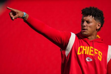 Patrick Mahomes of the Kansas City Chiefs warms up before a preseason game
