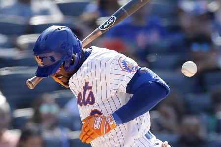 Starling Marte is hit by a pitch at Citi Field in July