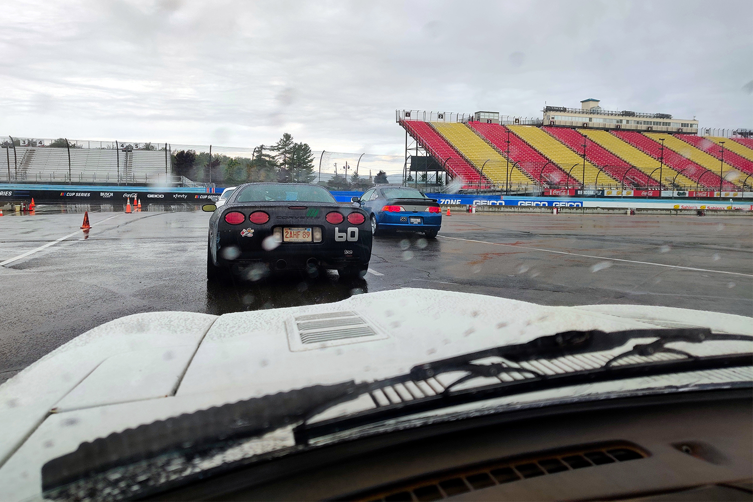 Rain on the windshield of a race car heading out to the track at Watkins Glen International racetrack in New York