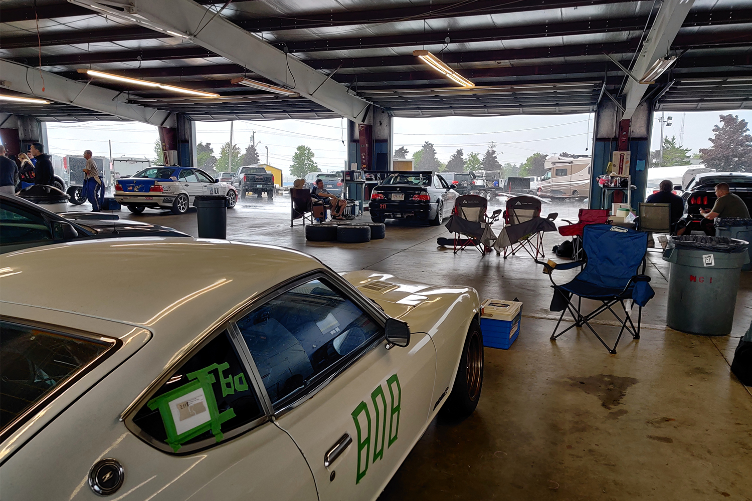 Sitting inside a garage at Watkins Glen International while it rains outside