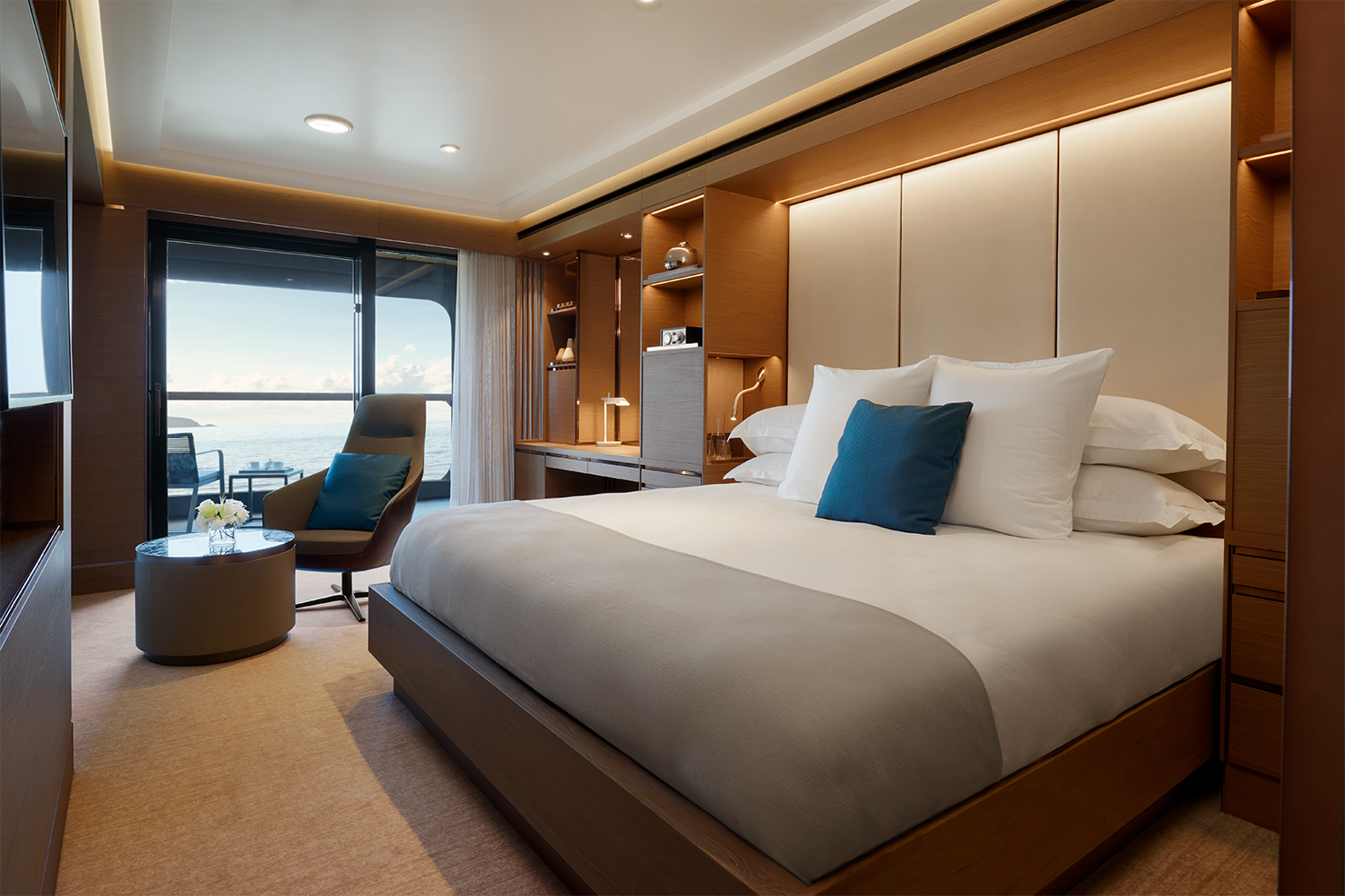 A bedroom in the new Evrima superyacht from The Ritz-Carlton Yacht Collection