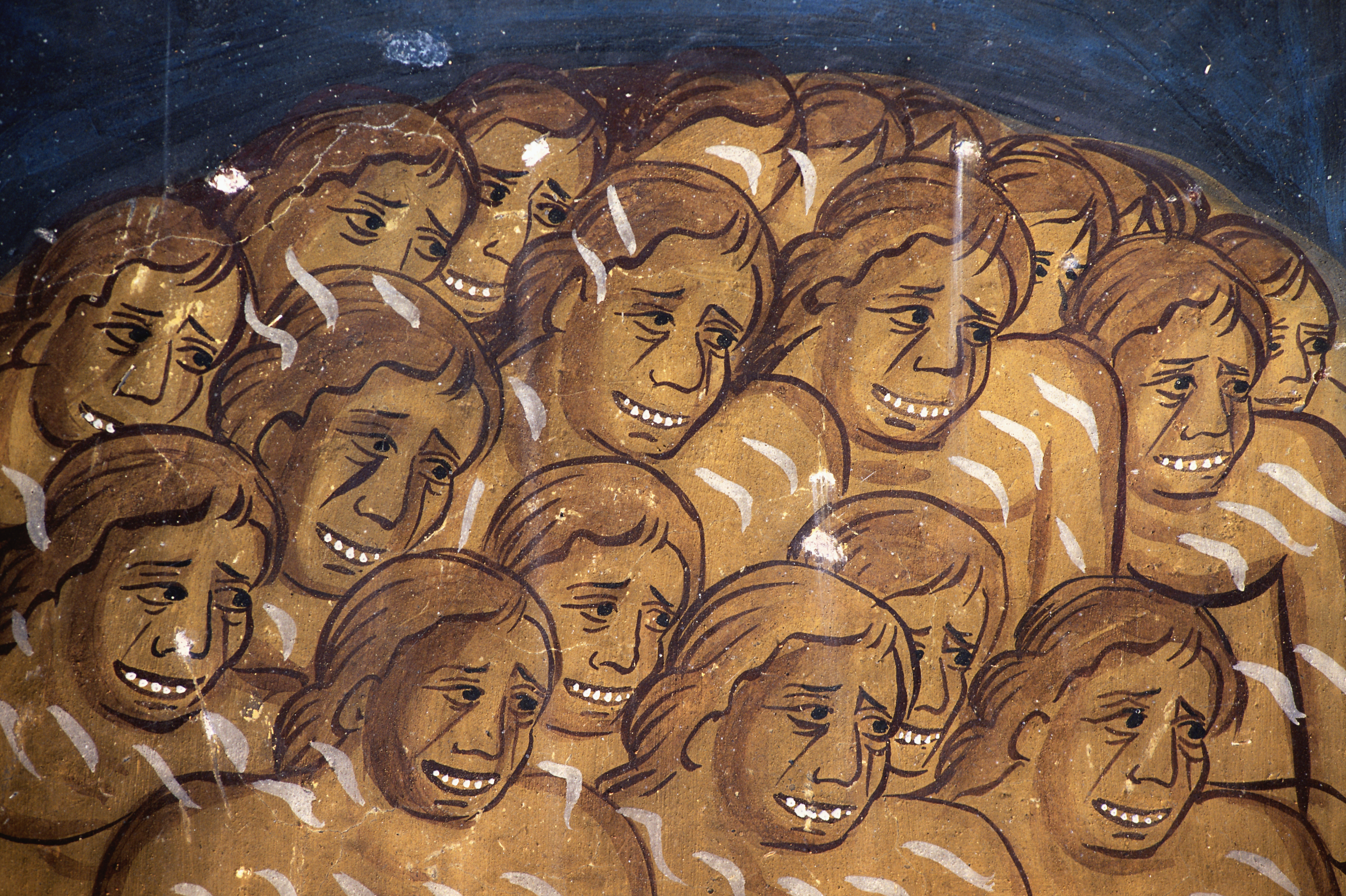 A creepy Medieval pictograph of smiling men.