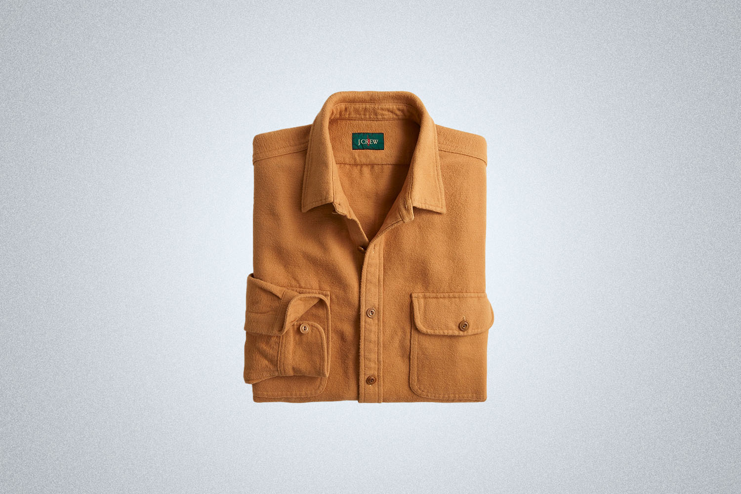 The J.Crew Heavyweight chamois workshirt on a gray background