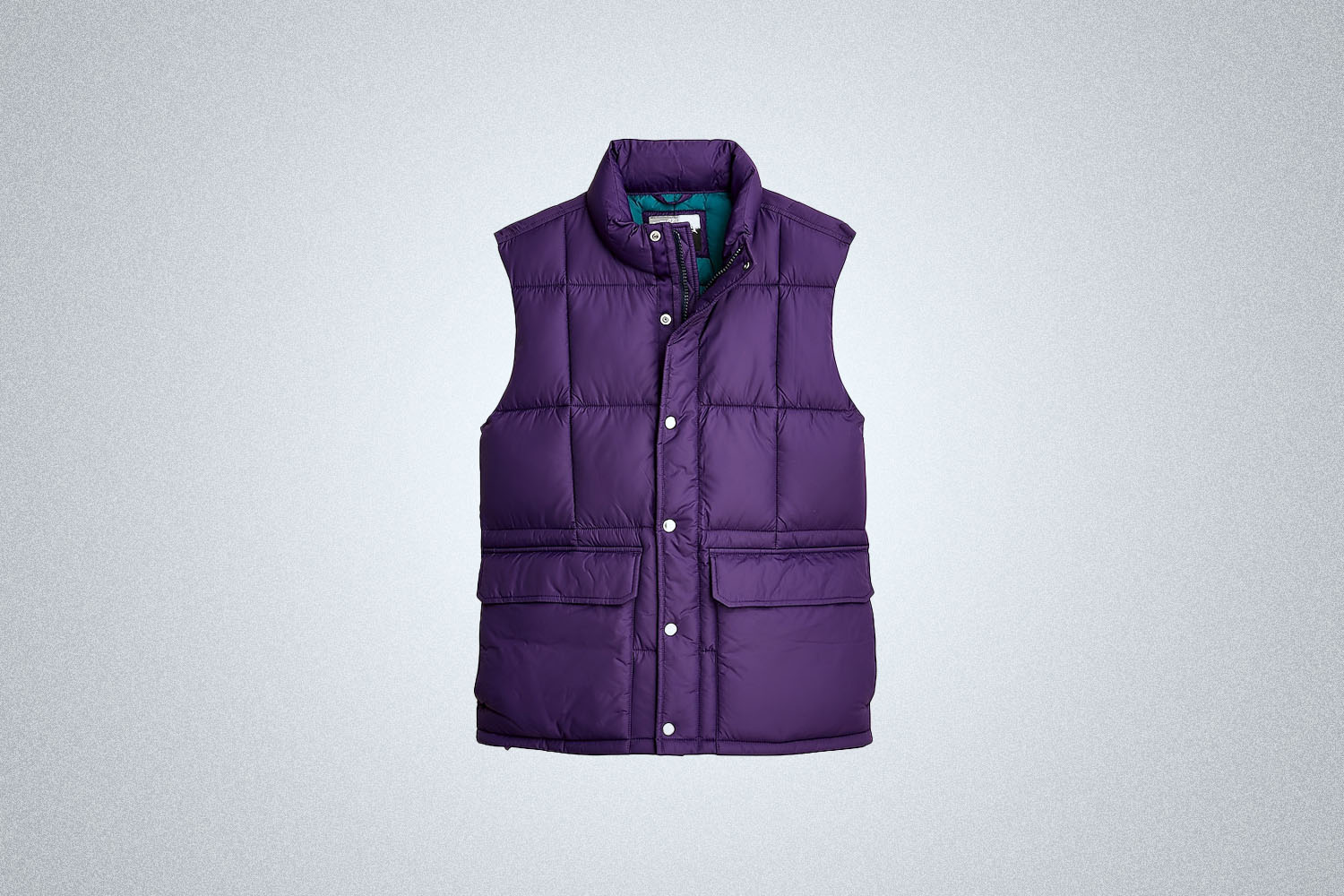 The J.Crew Nordic puffer vest with PrimaLoft on a gray background