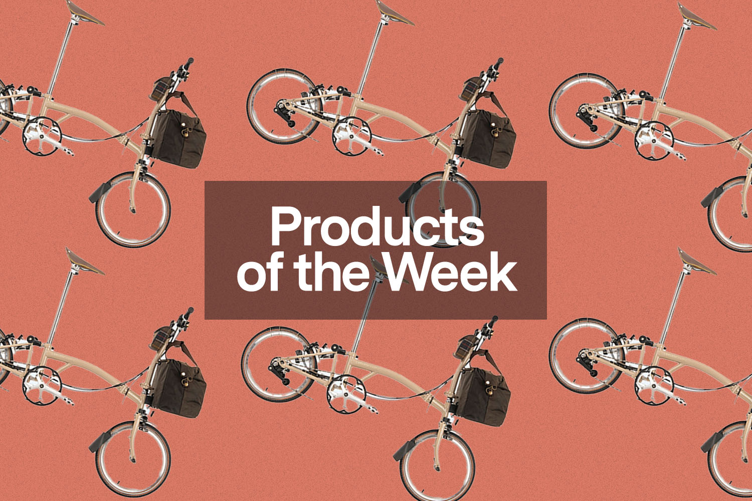 The Barbour Brompton collaboration Bike on a pink background