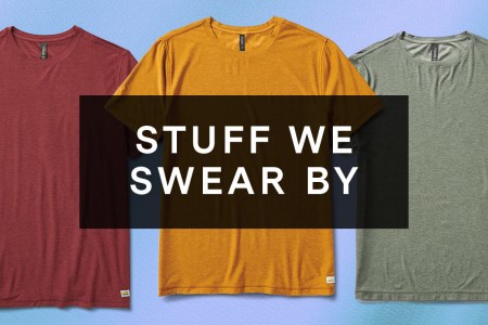 A box with text that reads "STUFF WE SWEAR BY" overlaid on three of Vuori's Strato Tech Tee