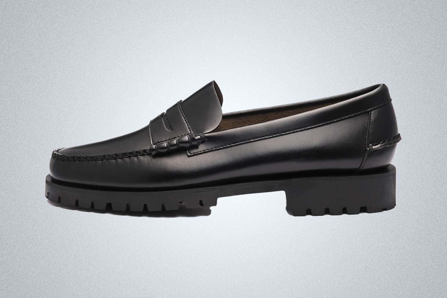a pair of black Sebago Dan Loafers on a grey background
