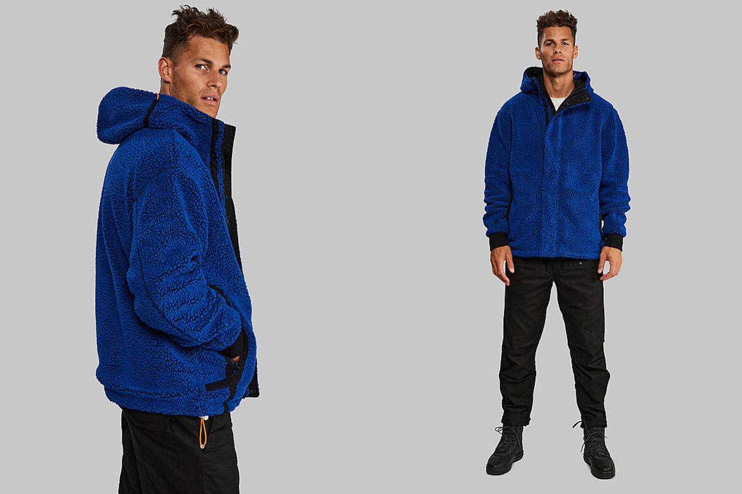 two model shots of a model in a blue Garbage Fleece from Vollebak on a grey background