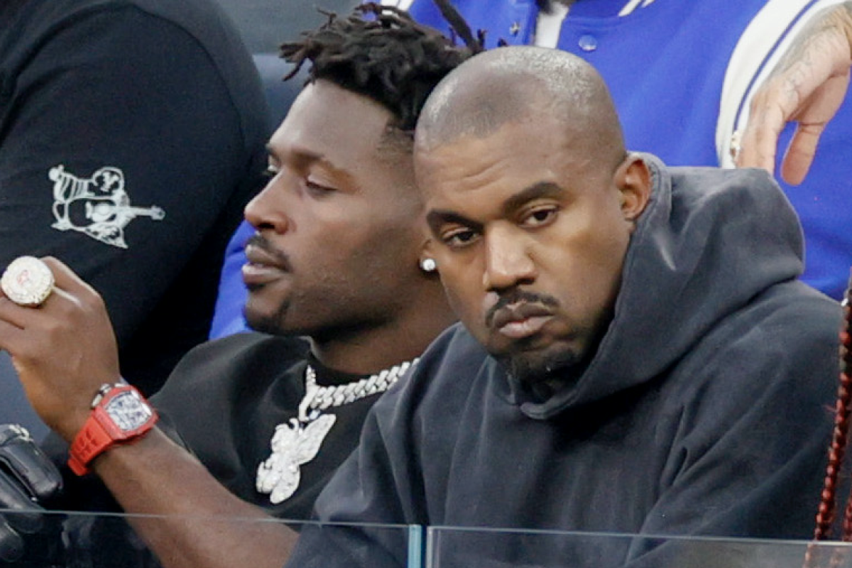 Antonio Brown and Kanye West attend Super Bowl LVI.