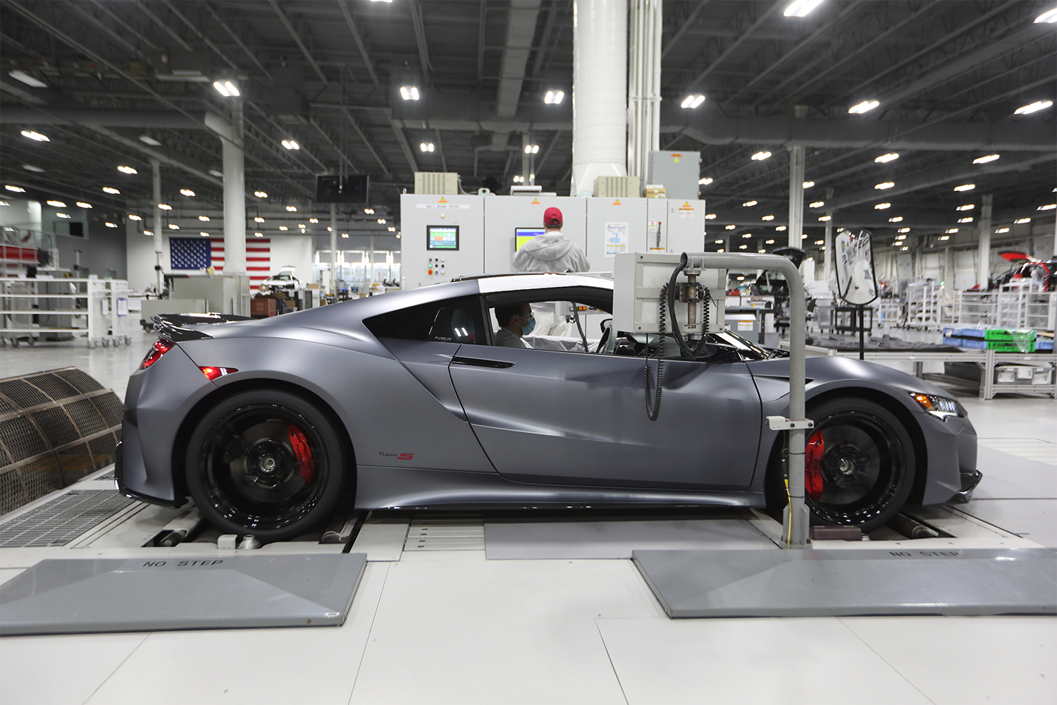 An Acura NSX Type S undergoing quality inspection on a dynamometer