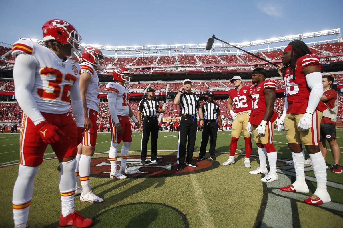 Captains of the 49ers and Chiefs meet for the pregame coin toss.