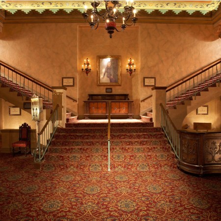 The grand staircase at the Plaza Theatre, one of the most haunted places in Texas