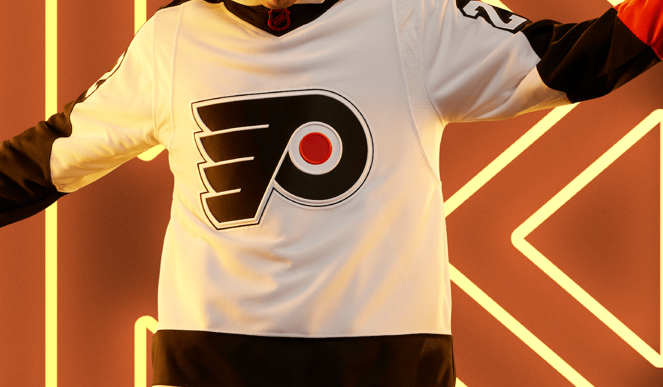 Another clean white look from this year’s collection, this is a historic remix that honors the Flyers’ 1974 and 1975 Stanley Cup Championships. The slight accents of orange really stand out on this jersey, given its predominantly black-and-white colorway.