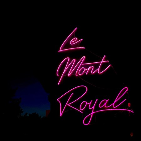 Exterior sign for Le Mont Royal in the Adams Morgan neighborhood in Washington, D.C.
