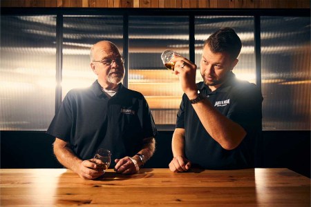 Master Distillers Fred and Freddie Noe of Jim Beam examining whiskey. The two distillers discussed the future of bourbon.
