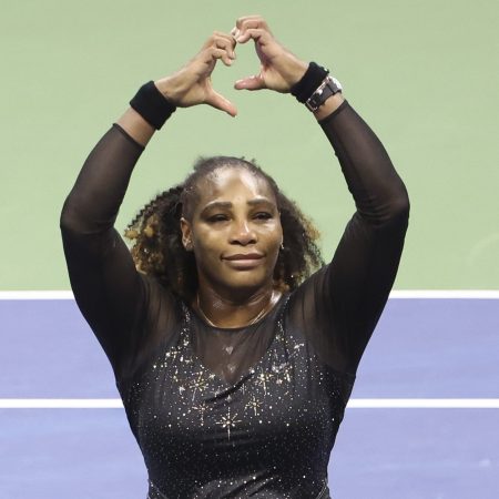 Serena Williams salutes fans after losing at the 2022 US Open in NYC. According to Williams, she isn't retired.
