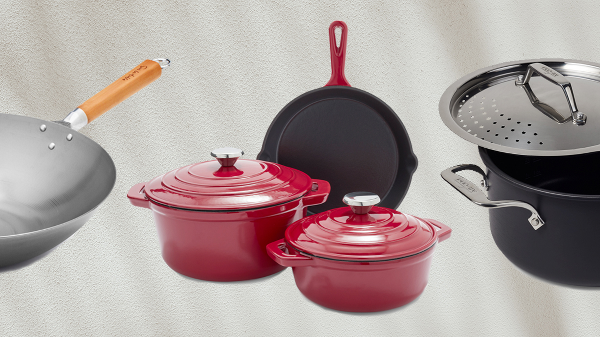A set of cast iron from Sur La Table, a carbon steel wok and stockpot from All-Clad, all discounted during Sur La Table's Semi-Annual Cookware Sale