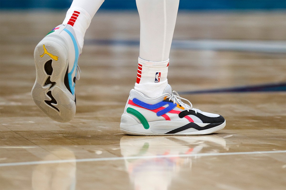 A detail of the shoes worn by Kyle Kuzma #33 of the Washington Wizards during the second quarter of the game against the Charlotte Hornets at Spectrum Center on October 10, 2022 in Charlotte, North Carolina.