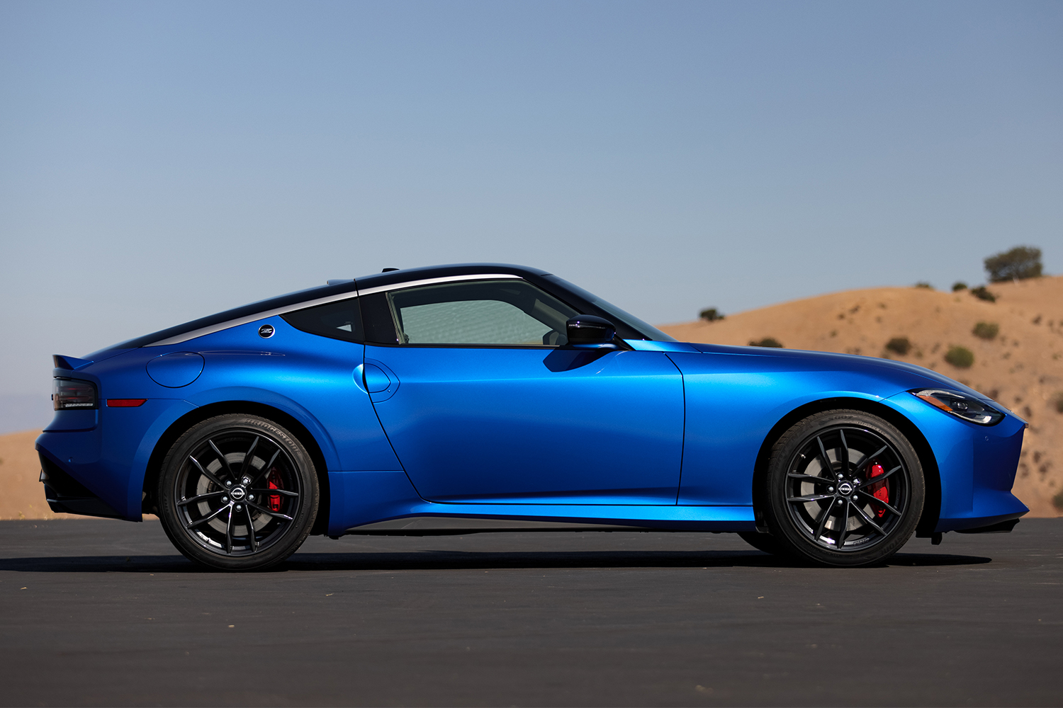The new 2023 Nissan Z sports car, shown in the blue color in profile