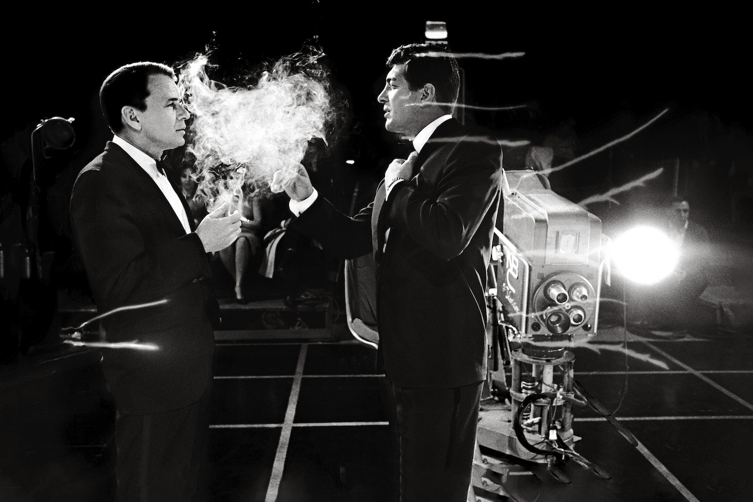 Frank Sinatra and Dean Martin smoking on set of the judy garland show