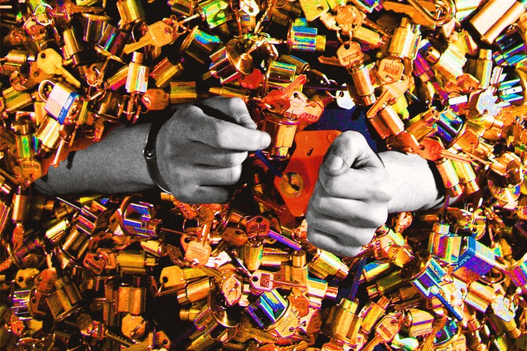 Two hands in a sea of locks