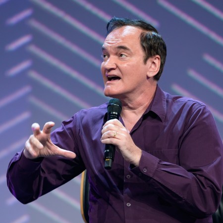 Quentin Tarantino gestures during his appearance at the OMR digital festival in Hamburg.