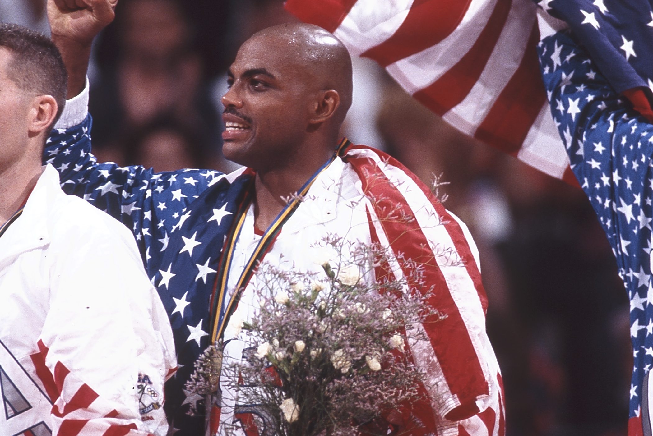 Charles Barkley of Team USA on the victor's podium after winning gold.