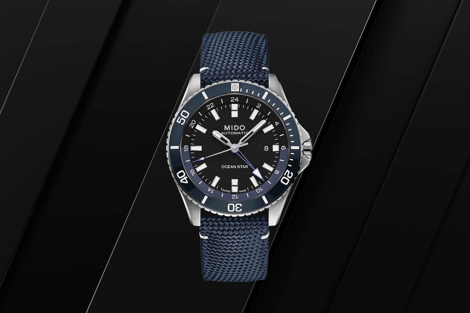 One of the best GMT watches, Mido Ocean Star GMT on a black background