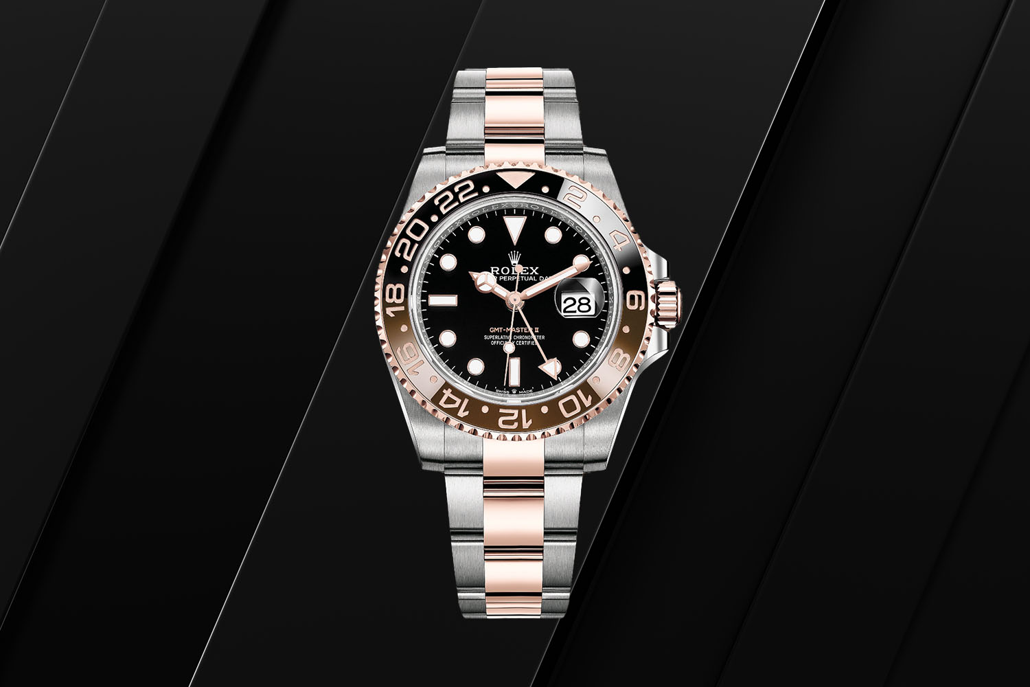 The Rolex GMT Master II on a black background