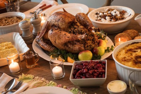 Dining table filled with Thanksgiving food. According to the Farm Bureau, this year's Thanksgiving dinner will see a significant price hike.